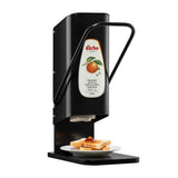 Darbo jam dispenser with lever, black stand, shown dispensing onto toast