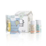 Dadaumpa baby care toiletries including a box, soap packets, and bottles on a white background