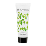 Be different energising bodywash 'Start with a Smile' text on a white tube with a white background