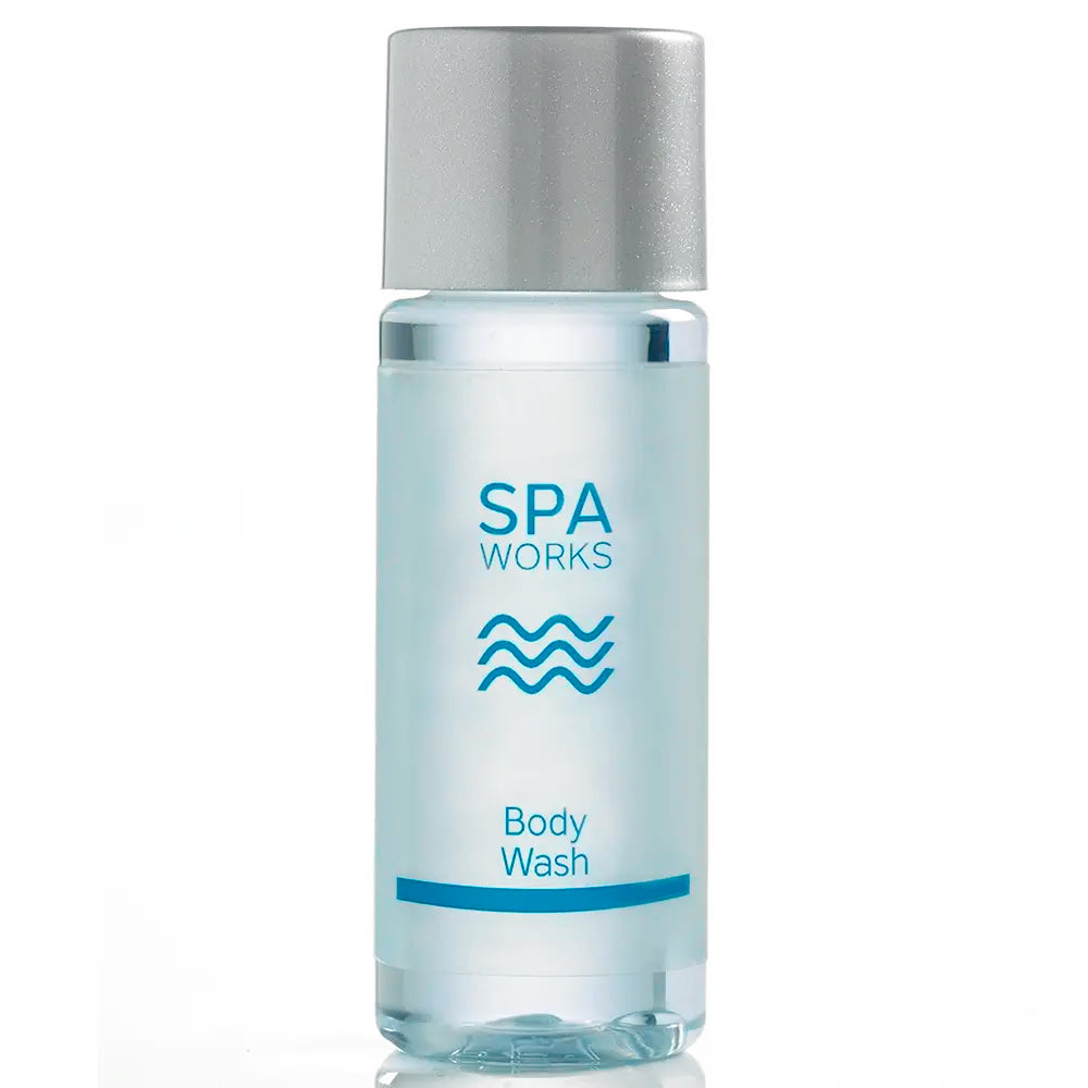 Bottle of Spa Works Body Wash with a silver cap on a white background