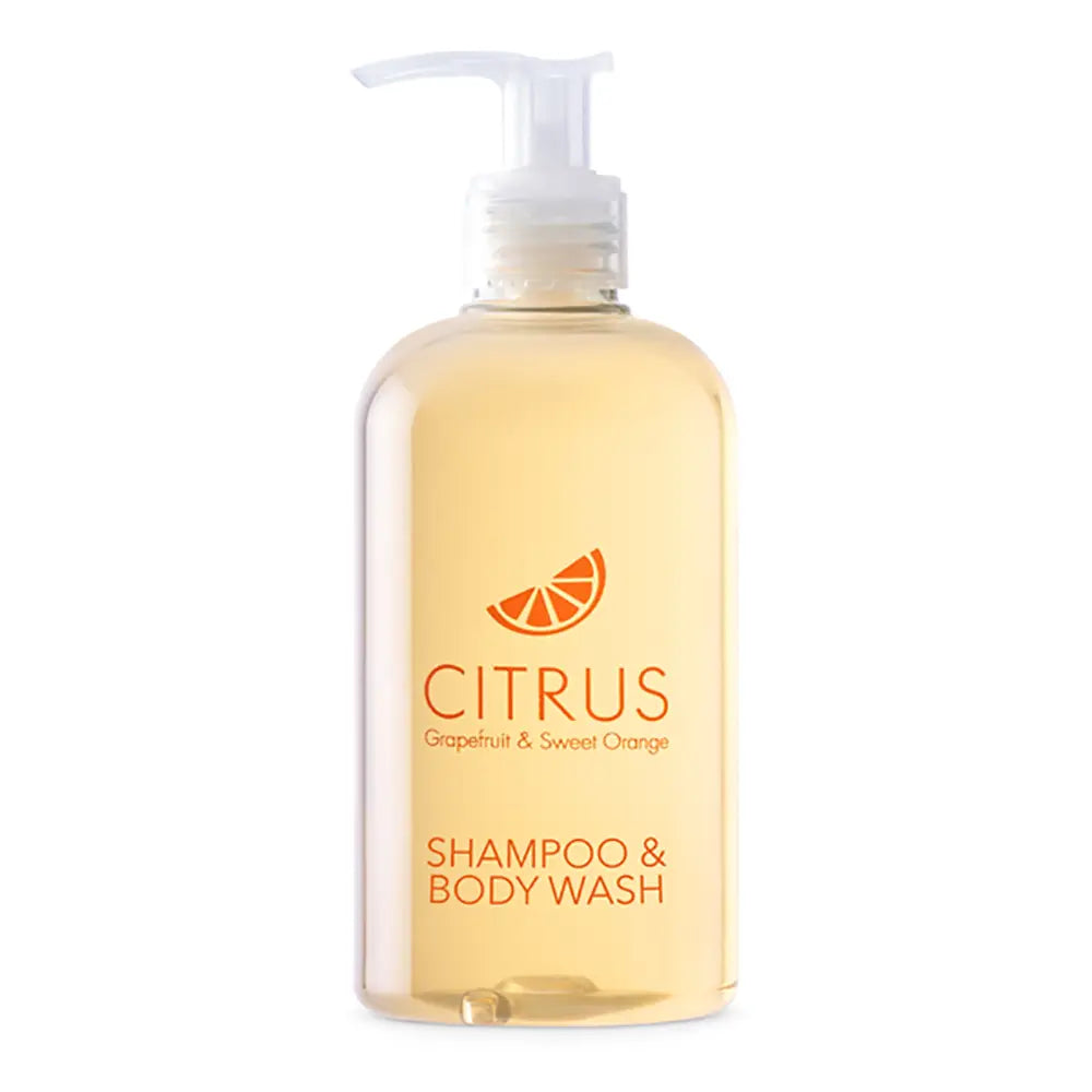 Bottle of Citrus Grapefruit & Sweet Orange Shampoo & Body Wash with a pump on a white background