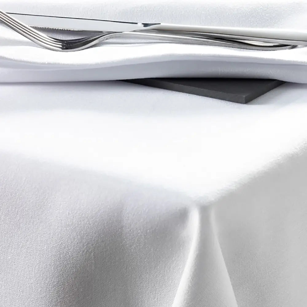 Close-up of Easycare Polyester Square Tablecloth with silverware on a table