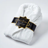 Easycare Supersoft Bathrobe in white, folded with branded band, one size fits most