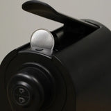 Close up of coffee pod in use in machine 