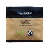 Wheatleys Colombian Arabica coffee bag with Fairtrade certification on a white background