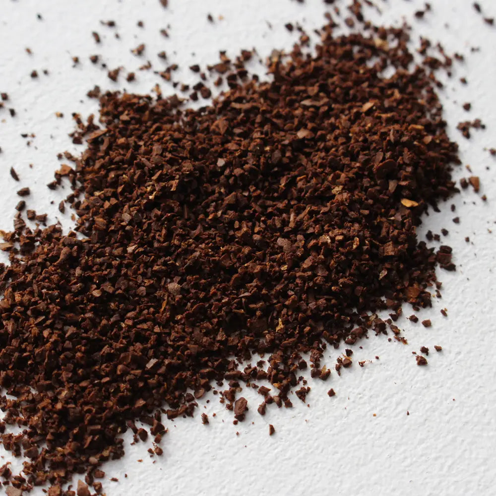 Close-up Wheatleys Colombian Arabica Cafetiere Coffee on a white surface