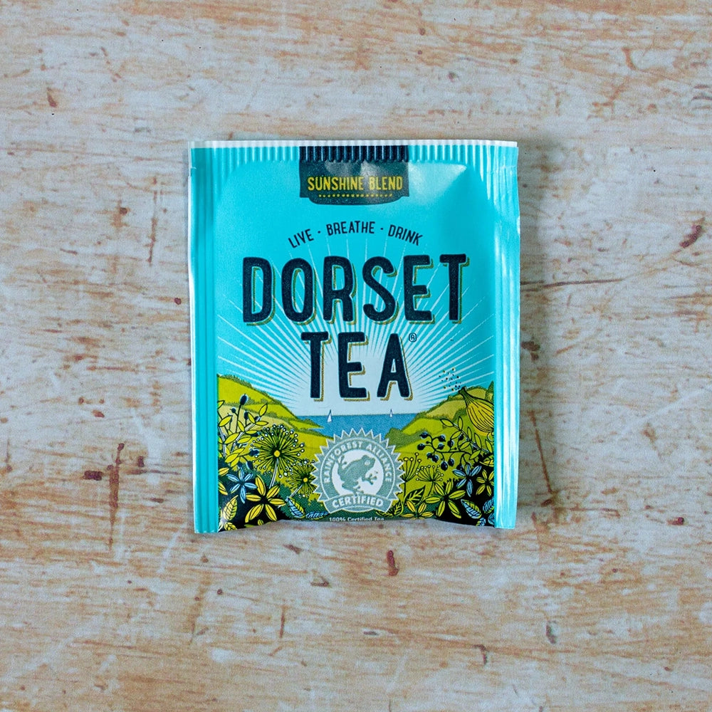 Dorset Tea package on a wooden surface