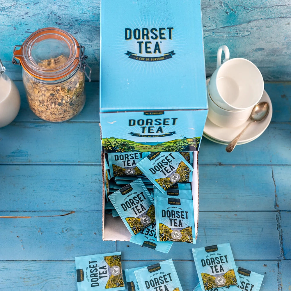 Box of Dorset Tea on a blue wooden surface
