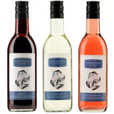 Three bottles of Founders Stone wine, including Merlot, Sauvignon Blanc, and White Zinfandel, on a white background.