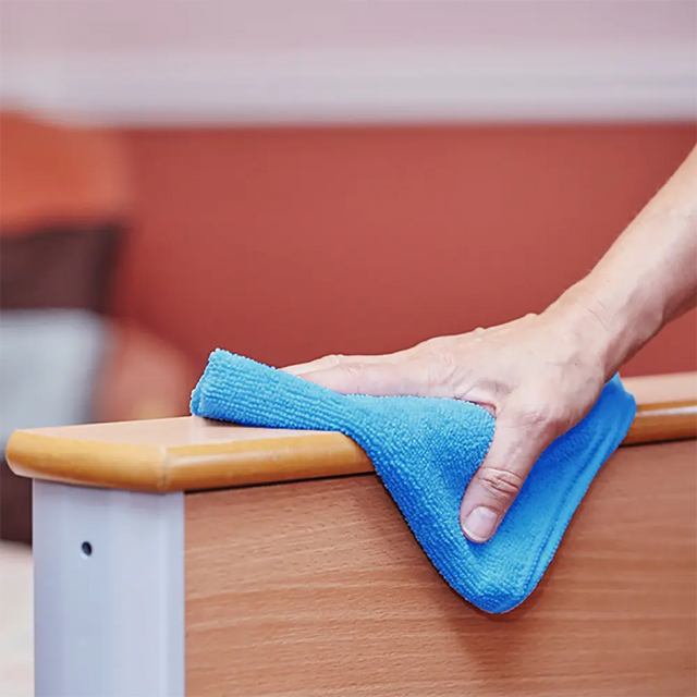 lifestyle image of blue cloth being used 