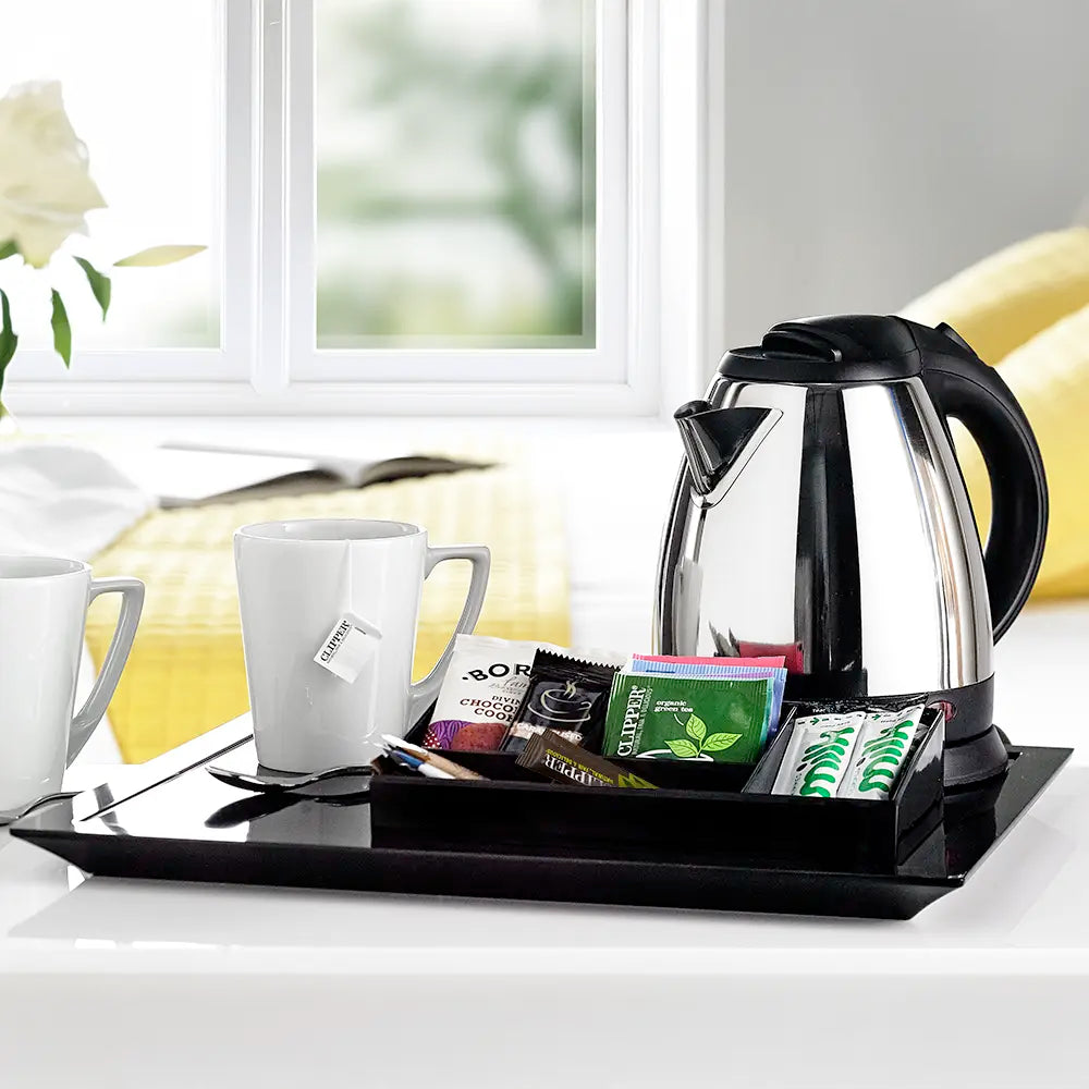 Black Melamine Welcome Tray Tea-making set with electric kettle, cups, and tea bags on a tray.