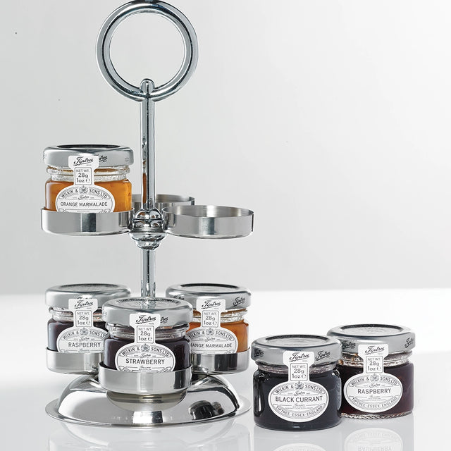 Close up of metal jampot stand displaying jams