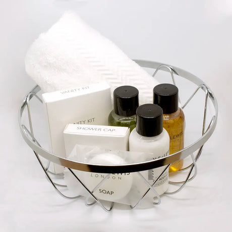 Chrome Plated Basket - 18cm -  Ideal not only for serving bread rolls, pastries, napkins or fruit as part of breakfast service but it also serves as a lovely way to present toiletries, amenities and face cloths in guest rooms and bathroom