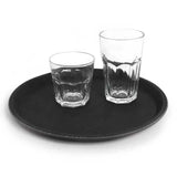 Two clear glasses on a Black Round Non-Slip Tray