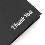 Buckram Bill Presenter showing 'thank you ' in sliver text 