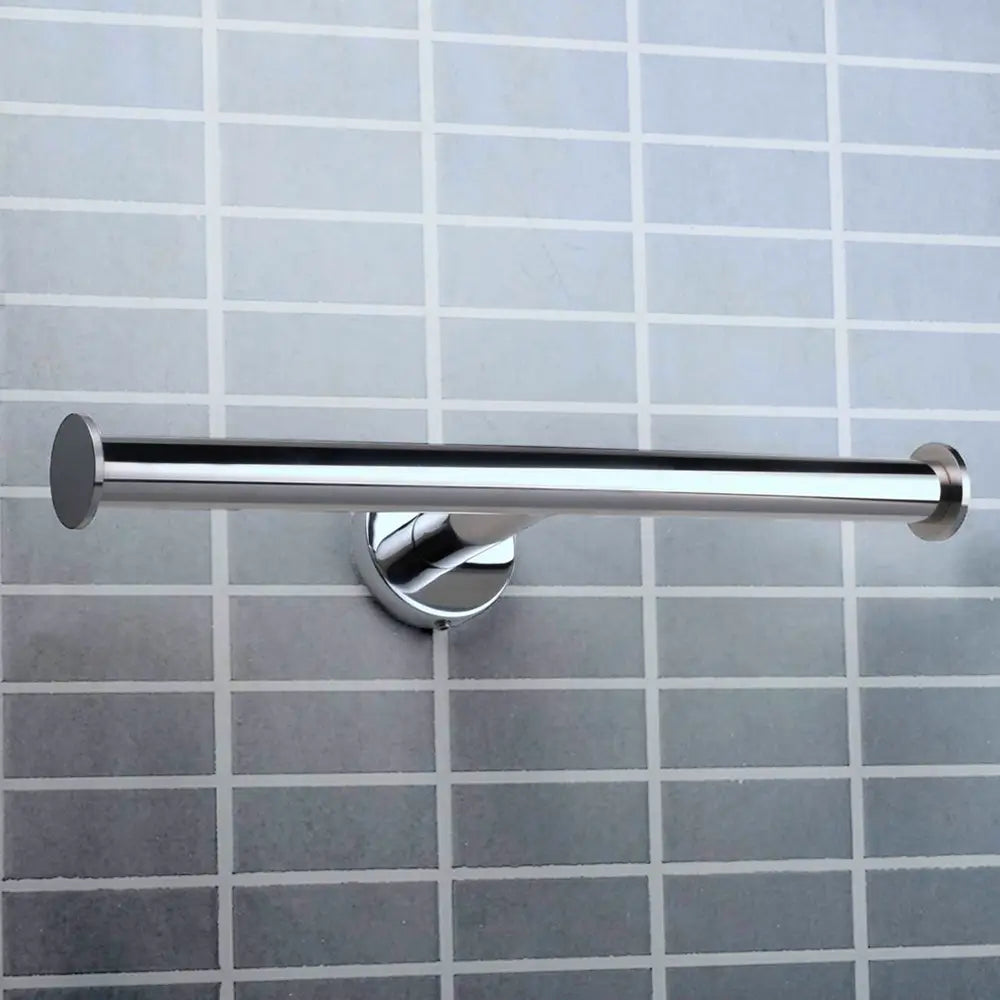 Chrome towel bar mounted on a tiled bathroom wall.