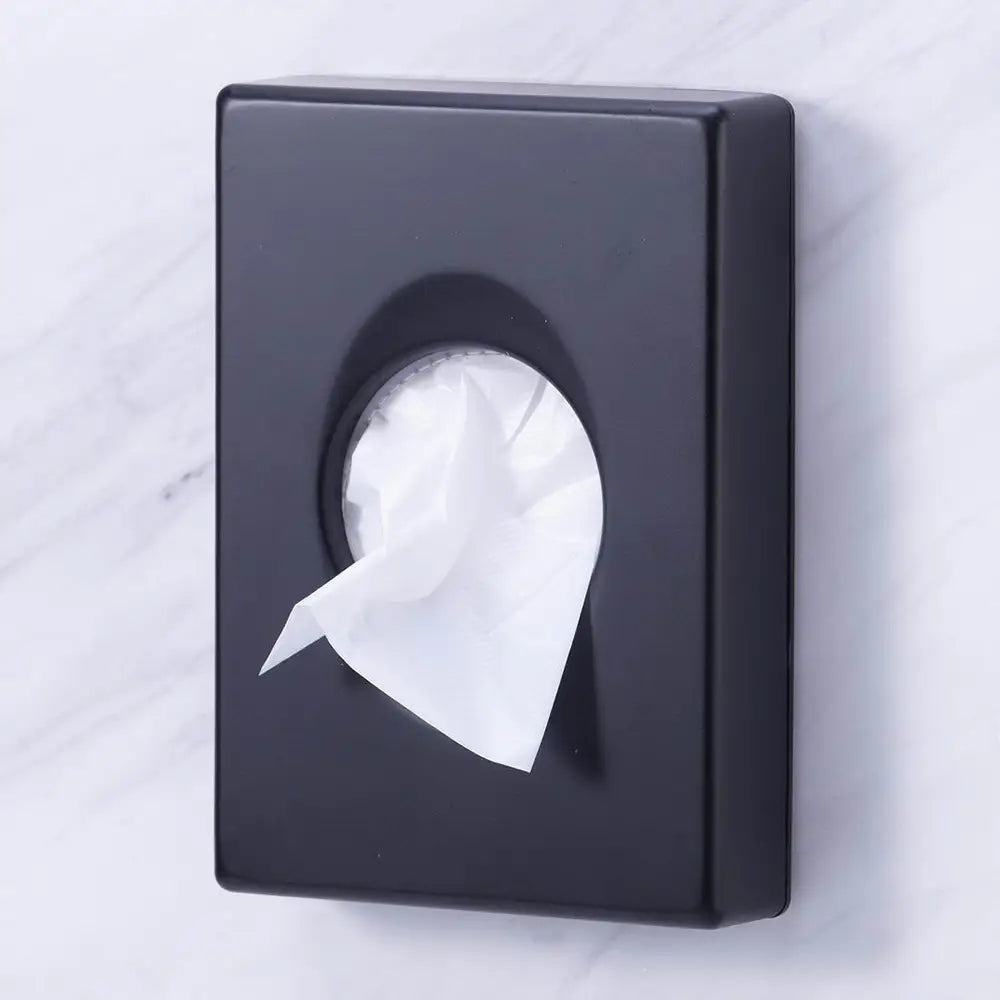 Black Hygiene Bag Holder on a wall with white hygiene bags inside 