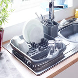 Addis draining rack on draining board next to a sink